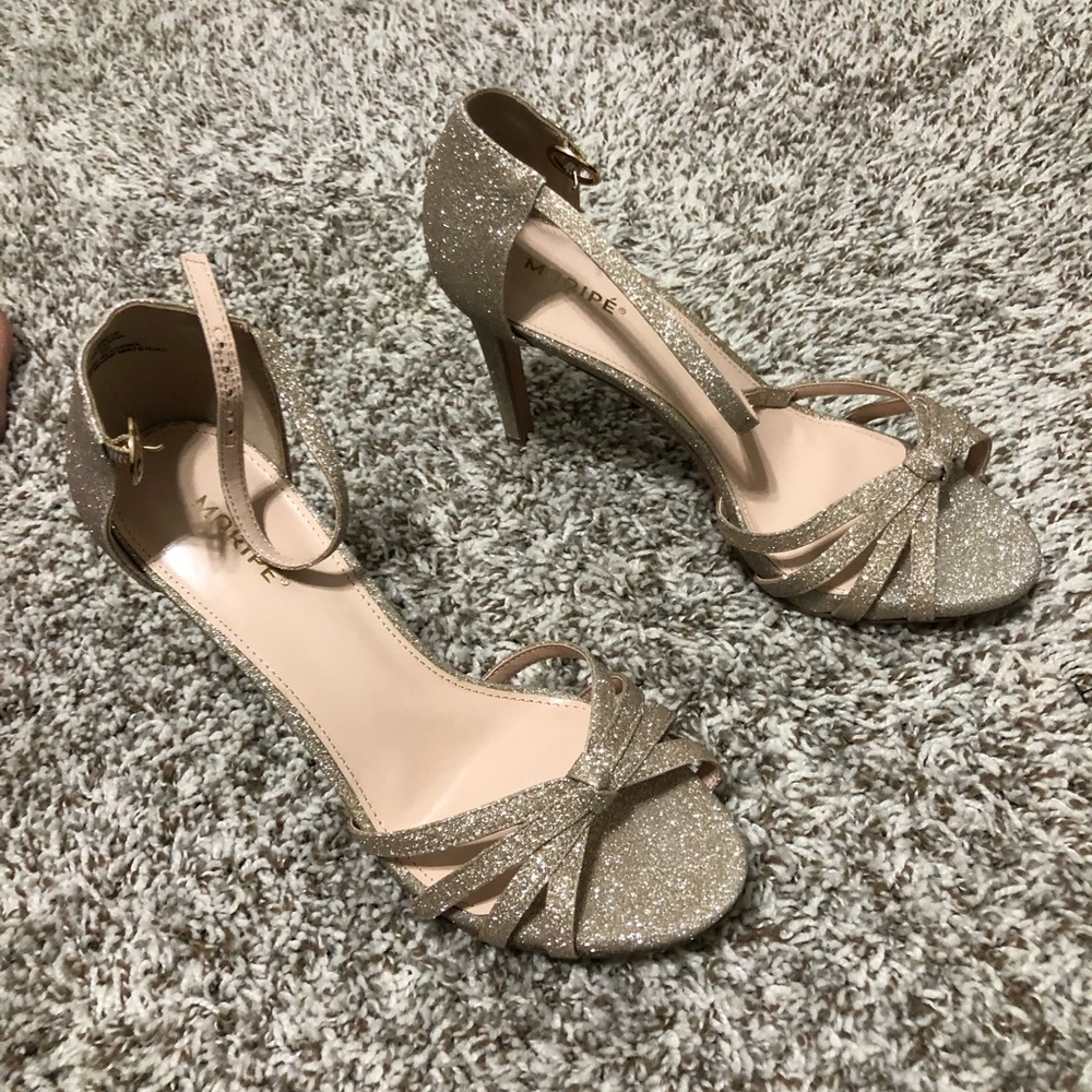 Gold high heels